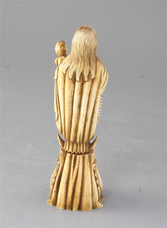 An Indo-Portuguese ivory group of the Virgin and Child, height 7.5in.